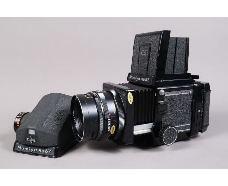 A Mamiya RB67 Professional S Camera, serial no C 524337, shutter working, body G-VG, light marks to waist level finder, RB67 