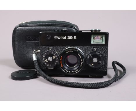 A Rollei 35 S Compact Camera, black, made in Singapore, shutter working, meter responsive, body G-VG, with Rollei HFT 40mm f/