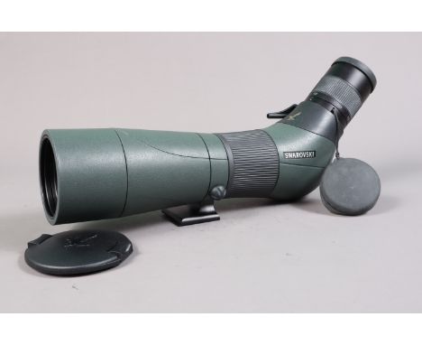 A Swarovski 65 HD Spotting Scope, 20x-60x, body G-VG, some light wear, elements VG, wwith front/rear caps and manual