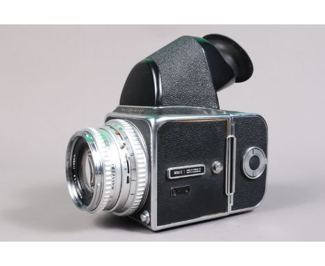 A Hasselblad 500C Camera, chrome, serial no TS 40703, shutter working, body G, some shifting to leatherette on left hand side