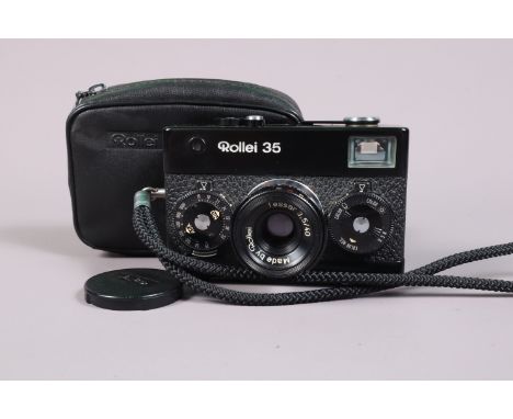 A Rollei 35 Compact Camera, black, made in Singapore, serial no 6154446, shutter working, meter responsive, body G-VG, with R