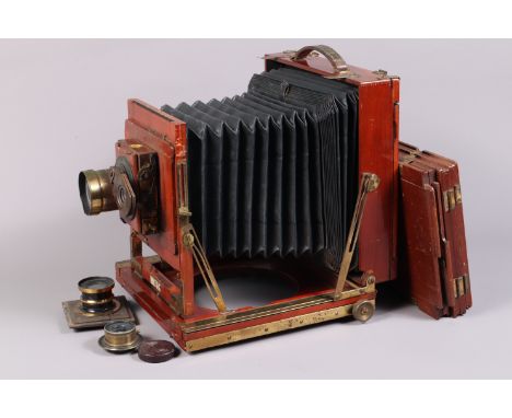 A Whole Plate Mahogany &amp; Brass Field Camera, circa 1900, tapered chamfered-corner black bellows, triple extension, focusi