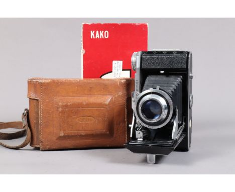 A Kershaw Curlew III Folding Camera, serial no 3/10033, format 6 x 9cm on 120 roll film, body G-VG, coating losses on film tr