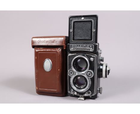 A Rolleiflex 3.5E TLR Camera, serial no 1785656, shutter sluggish on slow speeds, meter appears unresponsive,body G, light we