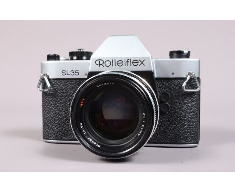 A Rolleiflex SL35 SLR Camera, made in Singapore, shutter working, meter untested, body G-VG, some light wear, with Carl Zeiss