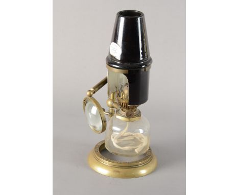 An early 20th Century brass Collins London Bockett Microscope Lamp,  with Swift ceramic heat diffuser, in mahogany case, 290m
