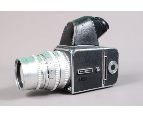 A Hasselblad 500C Camera, chrome, serial no TR 79695, shutter working, body G-VG, light wear, with prism viewfinder, viefinde