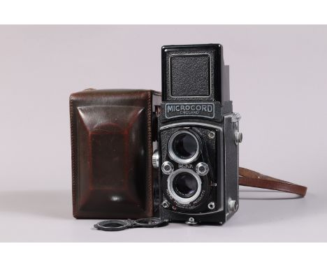 An MPP Microcord II TLR Camera, serial no 9202, body G-VG, dust to mirror, slight mist to screen, Prontor-SVS shutter working