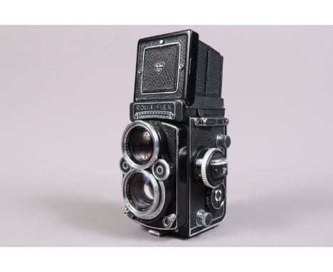 A Rolleiflex 2.8F TLR Camera, serial no 2955586, shutter working, meter functions, body G, some lifting to leatherette, some 