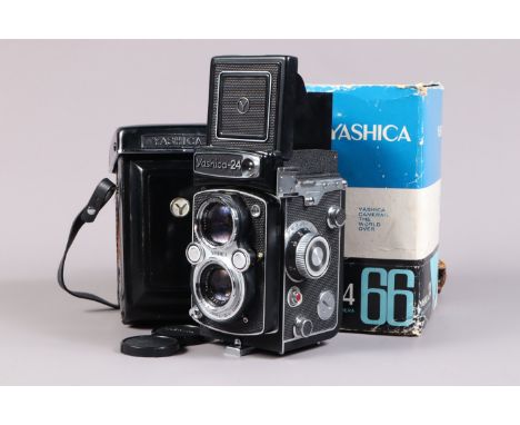 A Yashica Mat-24 TLR Camera, serial no L 6050614, for 220 roll film only, body VG, Copal-SV shutter, crank slightly noisy, me