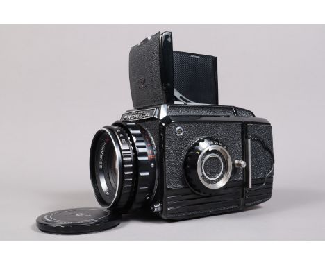 A Zenza Bronica S2 Camera, black, serial no CB 171185, shutter working, body G, light wear, with Zenzanon MC 80mm f/2.4 lens,