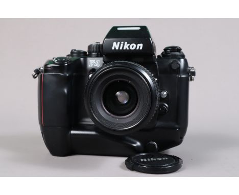 A Nikon F4 Camera, serial no 2560544, powers up, shutter working, appears to function as should, self timer working, meter re