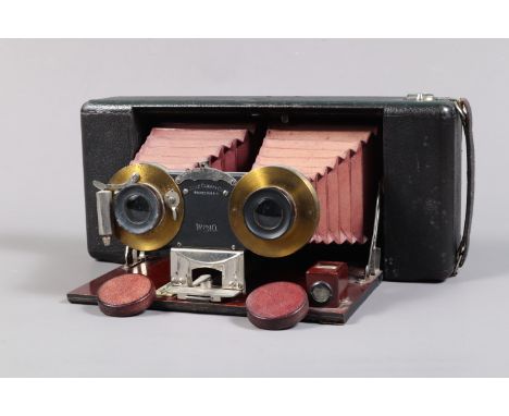 A Blair Stereo Weno Roll Film Camera, F-G, tripod socket area worn, shutter working, lenses F