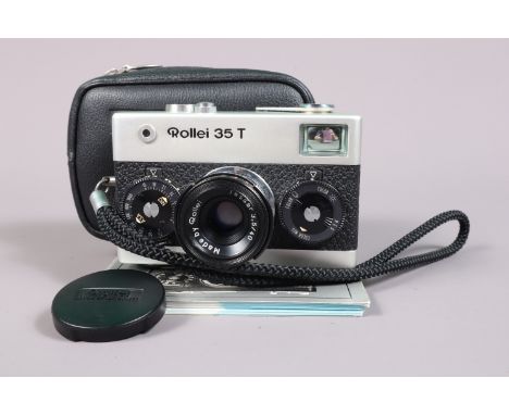 A Rollei 35 T Compact Camera, chrome, made in Singapore, serial no 6409516, shutter working, meter responsive, body G-VG, wit