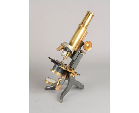  Microscopes,  Swift lacquered and anodised brass compound monocular microscope, with two eyepieces, triple nosepiece, stage 