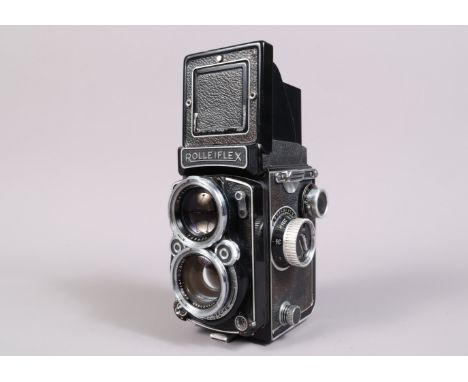 A Rolleiflex 2.8C TLR Camera, serial no 1407551, shutter working, body G, some wear to edges, some fading to leatherette, wit
