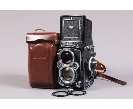 A Rolleiflex 2.8F K7F3 TLR Camera, serial no 2456615, circa 1967, body G-VG, slight dust to mirror, two pinpricks to focusing