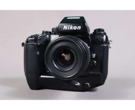 A Nikon F4 Camera, serial no 2408802, powers up, appears to function as should, self timer working, meter responsive, body G,