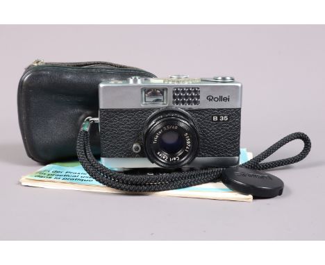 A Rollei B35 Compact Camera, chrome, made in Germany, shutter working, meter responsive, body G, some slight uneven edges to 