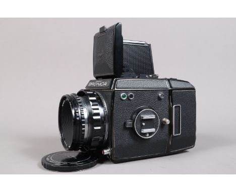 A Zenza Bronica EC Camera, black, serial no CB323343, shutter working, body G, some lifting to leatherette on edges, with Nik