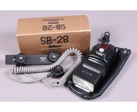 A Nikon Speedlight SB-28 Flashgun, serial no 3088391, body VG, powers up, flash fires, not otherwise tested, with maker's box