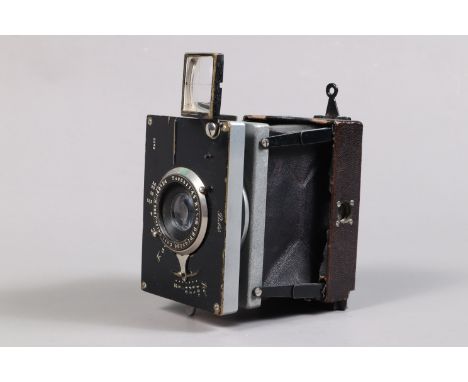 An Ica Bébé Strut Folding Plate Camera, for 4.5cm x 6cm plates, with Zeiss Tessar f/4.5 75mm lens, F-G, shutter erratic, lens