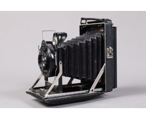 A KW Patent Etui Folding Plate Camera, serial no 66281, 6.5 x 9cm, body G, Sands Hunter &amp; Co Ltd London retailer's plate,