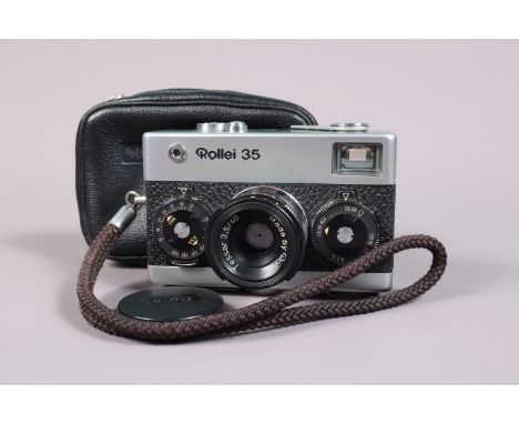 A Rollei 35 Compact Camera, chrome, made in Singapore, serial no 3478388, shutter working, meter appears unresponsive, body G