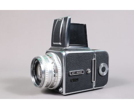 A Hasselblad 500C Camera, chrome, serial no CE 39538, shutter working, body G-VG, light wear, with Carl Zeiss 80mm f/2.8 Plan