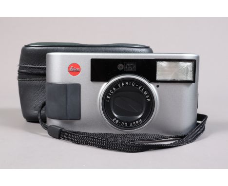 A Leica C3 Compact Camera, powers up, shutter working, flash working, otherwise untested, body G-VG, light marks, with Vario 