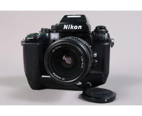 A Nikon F4 Camera, serial no 2134856, powers up, shutter working, appears to function as should, self timer working, meter re