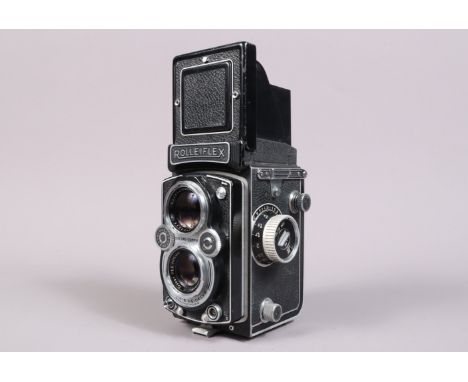 A Rolleiflex Automat TLR Camera,  model K4B, serial no 1733009, shutter working, body G, some light wear to viewing hood and 