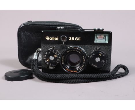 A Rollei 35 SE Compact Camera, black, made in Singapore, shutter sluggish on slow speeds, meter untested, body G-VG, with Rol