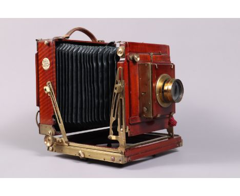 A Thornton Pickard Royal Ruby Half Plate Field Camera, chamfered cornered black bellows, triple extension, rear screen, body 