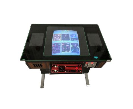 Cocktail table - arcade machine in good and working condition. Includes 60 games like: 1942 / 1943 / 1943 Kai / Amidar / Arka
