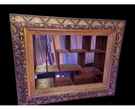 Mirror backed shadow box wall shelf with ornate frame. Size: 79 x 100 x 16 cm. Condition: Good. Location: The Netherlands, Ti