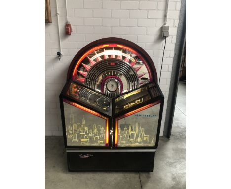 Wurlitzer New York built from 1991 to 1993, alongside the famous Wurlitzer OMT, these CD jukeboxes share the same mechanism. 