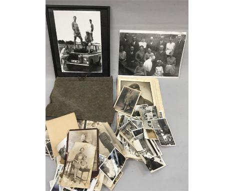 A collection of vintage photographs to include an album.