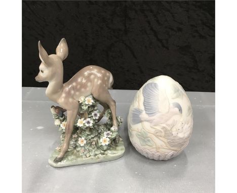 A Lladro Fawn and friend together with a 1993 limited edition egg only available in the usa both boxed.