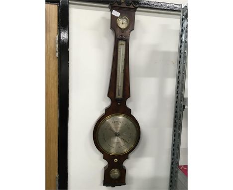 An antique mahogany banjo barometer with thunder, dry/damp and level by dixey.
