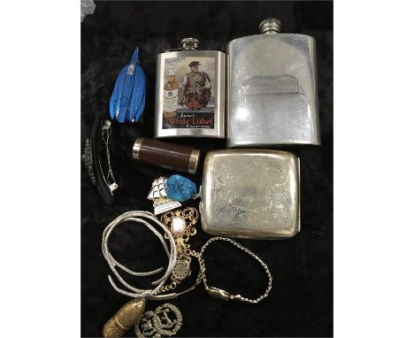 A box of costume jewellery including a Bobbin shaped gold coloured needle case two hip flasks and a plated cigarette case and