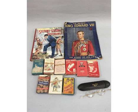A selection of collectables to include card games (Dan Dare, Cinderella, Happy Families etc.), Books and vintage spectacles.