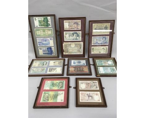 A selection of small frames containing various vintage paper notes. Also some without frames.