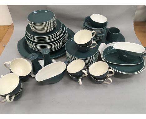 A vary large quantity of Poole Pottery. A mid blue and white dinner service together with a twin tone dinner service. 1960s/1