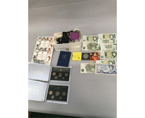 A collection of vintage coins and banknotes.