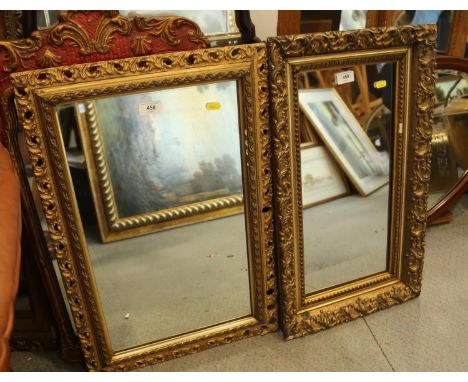 A rectangular gilt framed wall mirror, 25" x 14 1/2", and another similar, 25" x 17" 