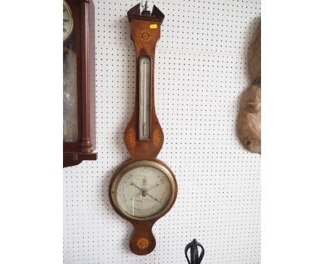 A 19th century mahogany and inlaid banjo barometer and thermometer by A CarioliCondition:The arched pediment has a chip to bo