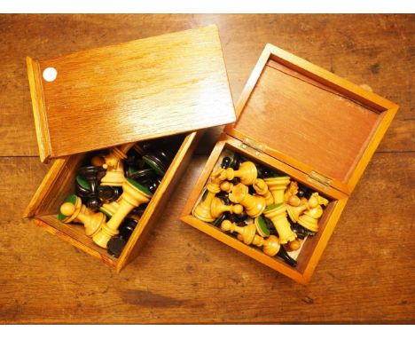 A late 19th century boxwood and ebony Staunton pattern chess set, king 3 1/2" high, and another similarCondition & Additional