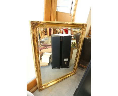 A rectangular gilt framed wall mirror with bevelled plate, 45" x 35" 
