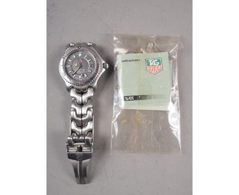 A gentleman's TAG Heuer automatic chronometer wristwatch, number 01478, with stainless steel bracelet and extra linksConditio